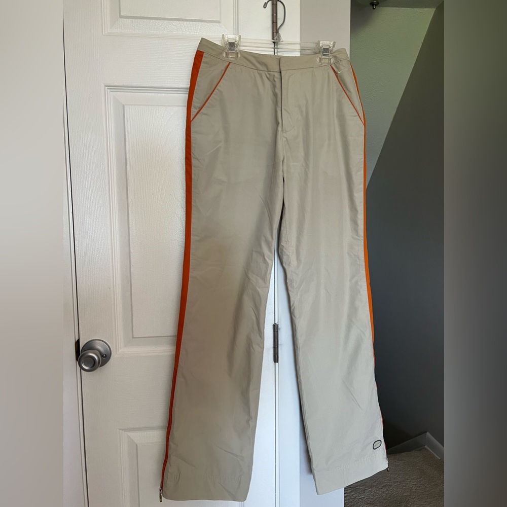 Nike sports lined pants,size 6 high rise with 4 pockets , zipper in back pockets